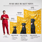 Yellow dog blanket with black Labrador dog design and size chart for different dog blanket sizes.