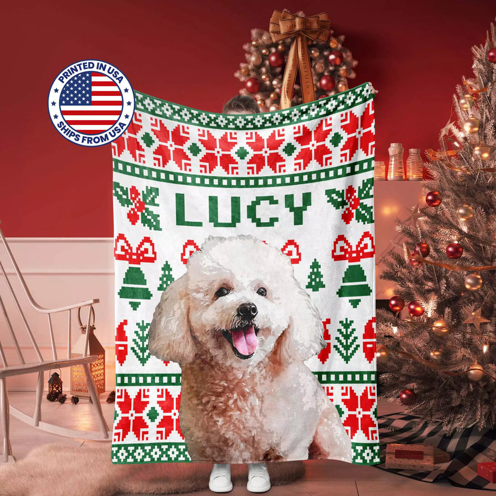 Dog blanket a Christmas-themed ugly sweater with 'LUCY' printed on it, in a festive room with a Christmas tree.