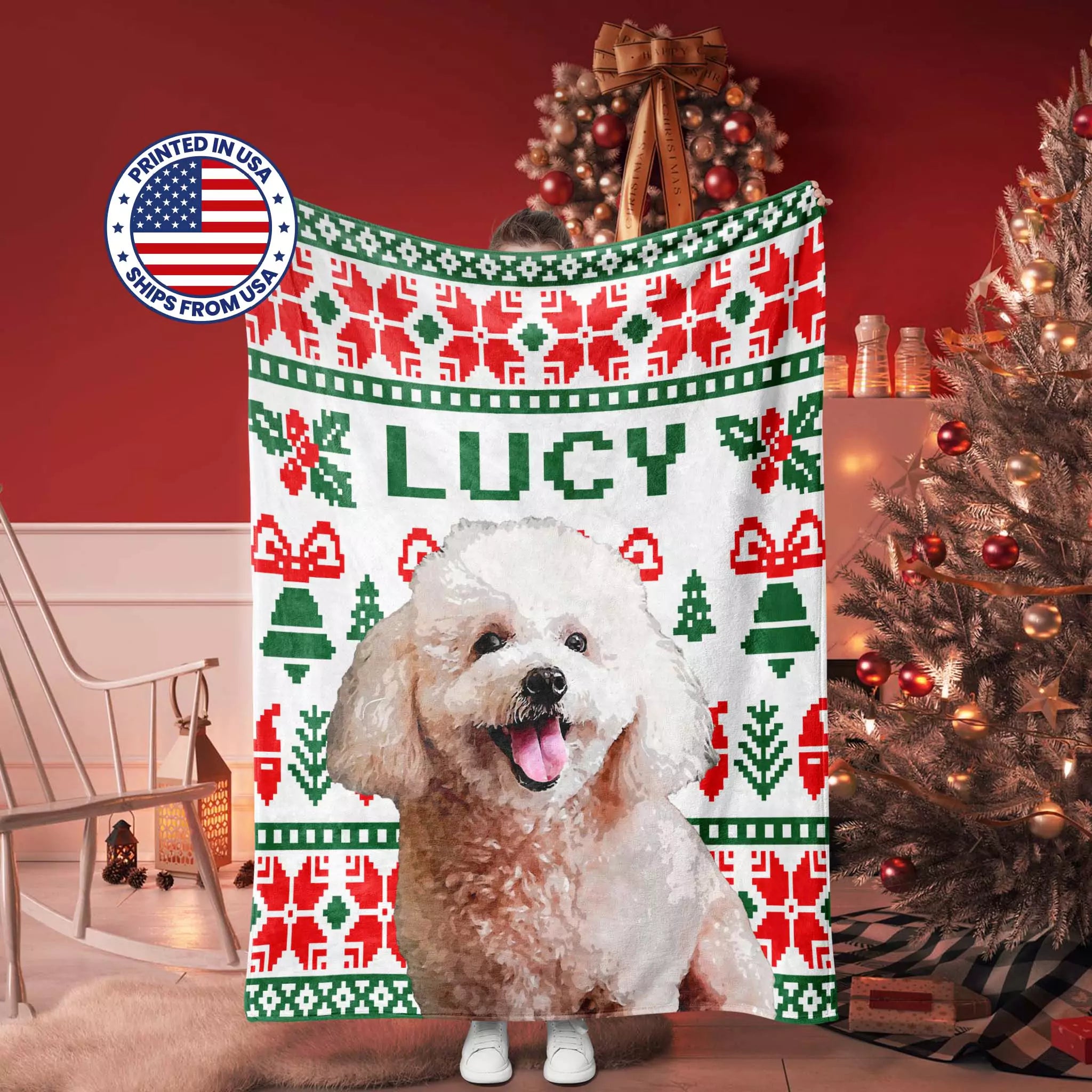 Dog blanket a Christmas-themed ugly sweater with 'LUCY' printed on it, in a festive room with a Christmas tree.