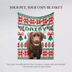 Custom watercolor pet blanket with a dog's photo and 'DAISY' text on a gray background.
