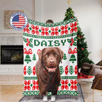 Dog blanket with a dog's face printed on it, draped over a person, in a room with a Christmas tree.