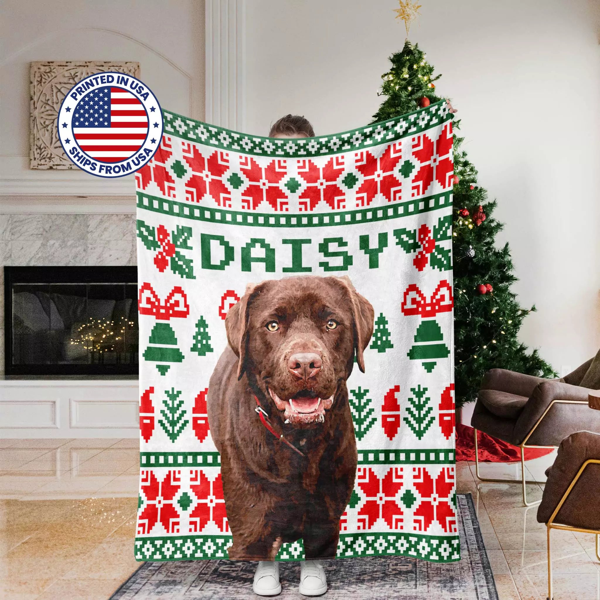 Dog blanket with a dog's face printed on it, draped over a person, in a room with a Christmas tree.
