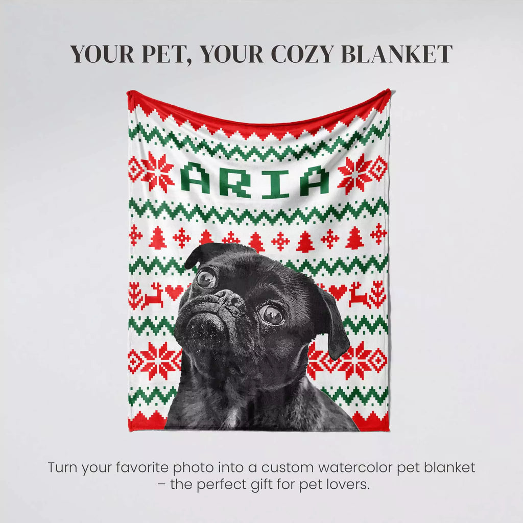 Dog in a custom watercolor dog blanket with monogrammed 'ARIA' text on a gray background
