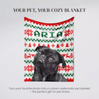 Dog in a custom watercolor dog blanket with monogrammed 'ARIA' text on a gray background