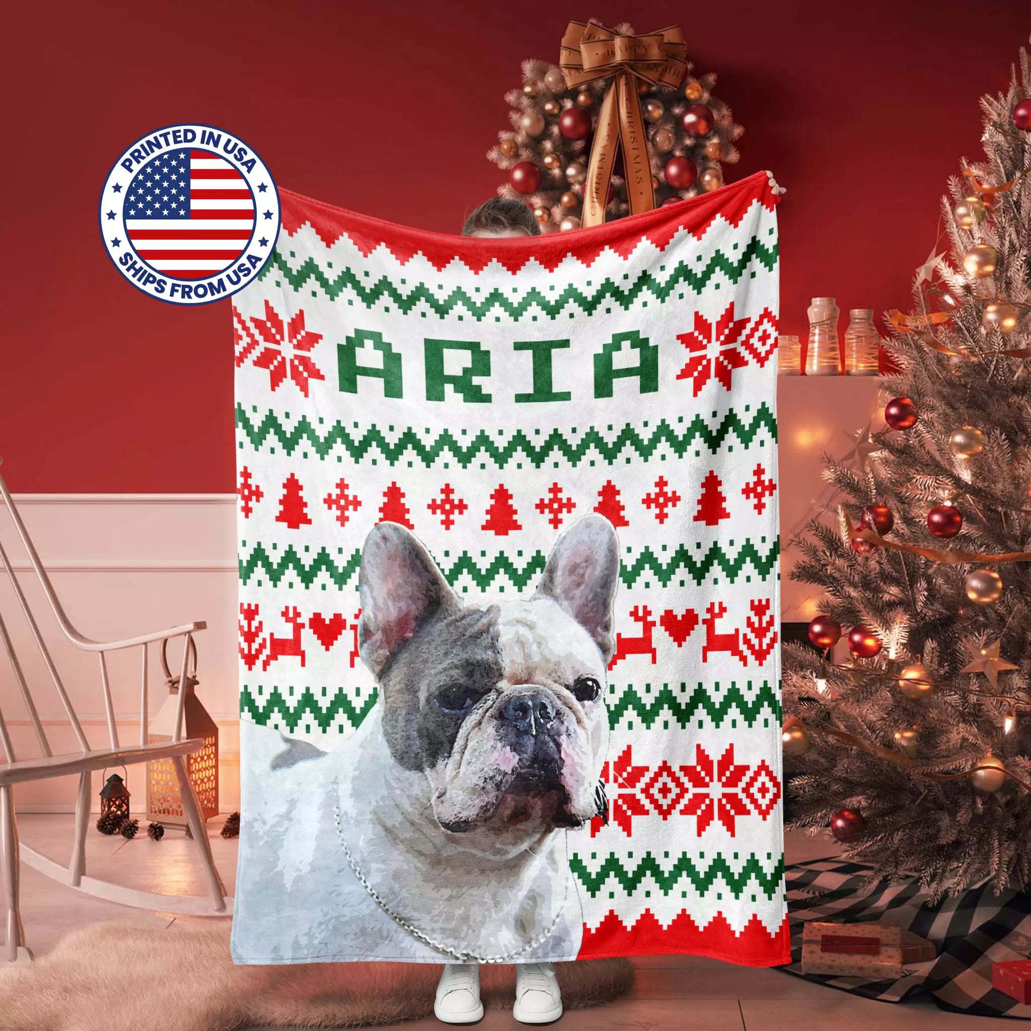 French Bulldog dog blanket with 'ARIA' printed on it, featuring a Christmas-themed ugly sweater pattern, in a room decorated for Christmas.