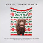 Dog wearing a personalized dog blanket with 'DAISY' on a gray background