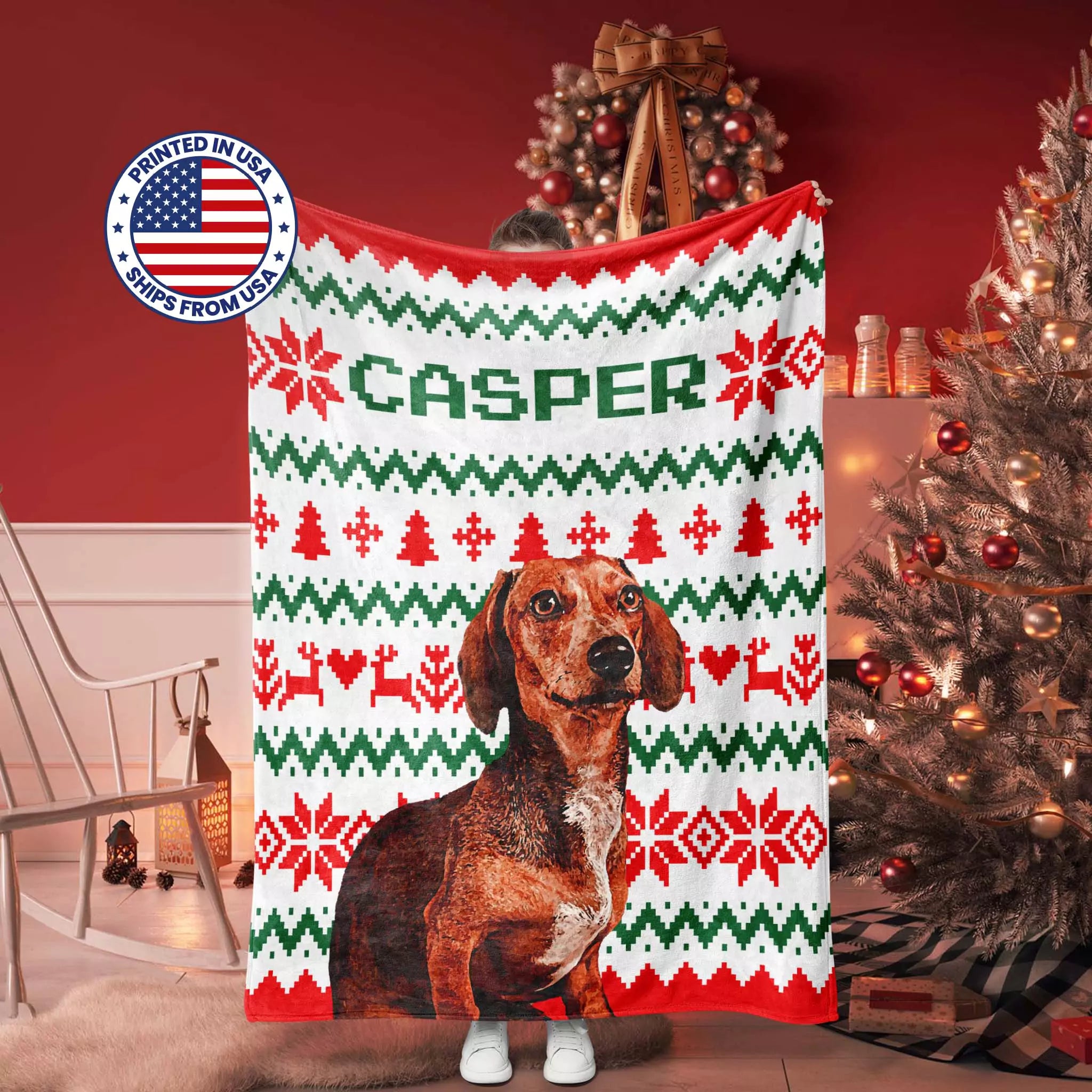 Christmas-themed ugly sweater Dachshund dog blanket with a dog design and 'Casper' branding, displayed in a festive room.