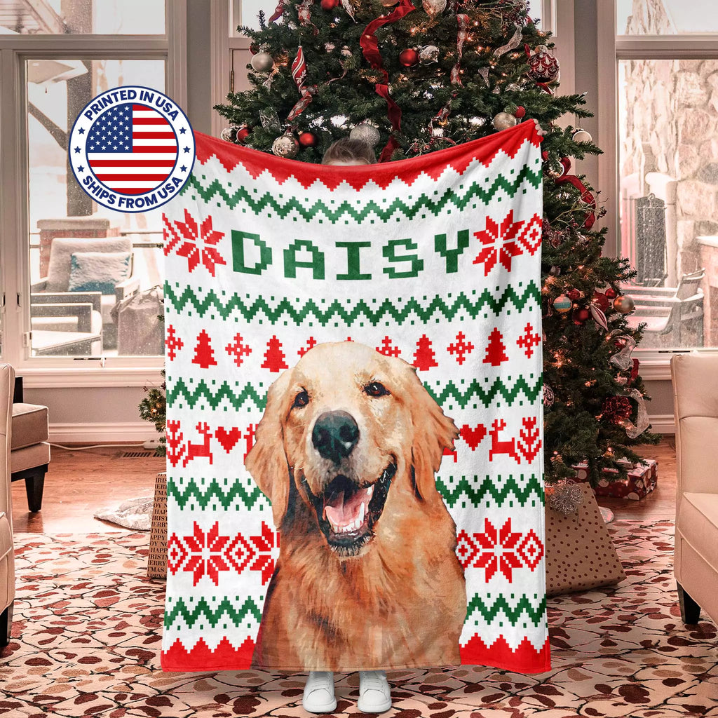 Decorative dog blanket with a dog's face and 'DAISY' text, Christmas tree in the background
