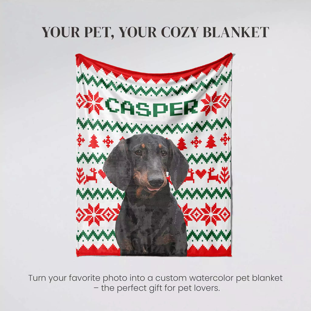 Dachshund dog on a 'Casper' branded blanket with ugly sweater Christmas pattern